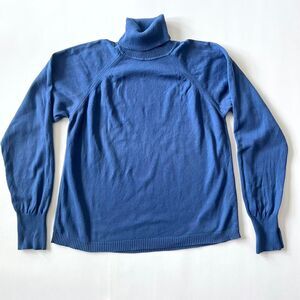 Blue Talbots turtleneck sweater with long sleeves and ribbed cuffs and hem